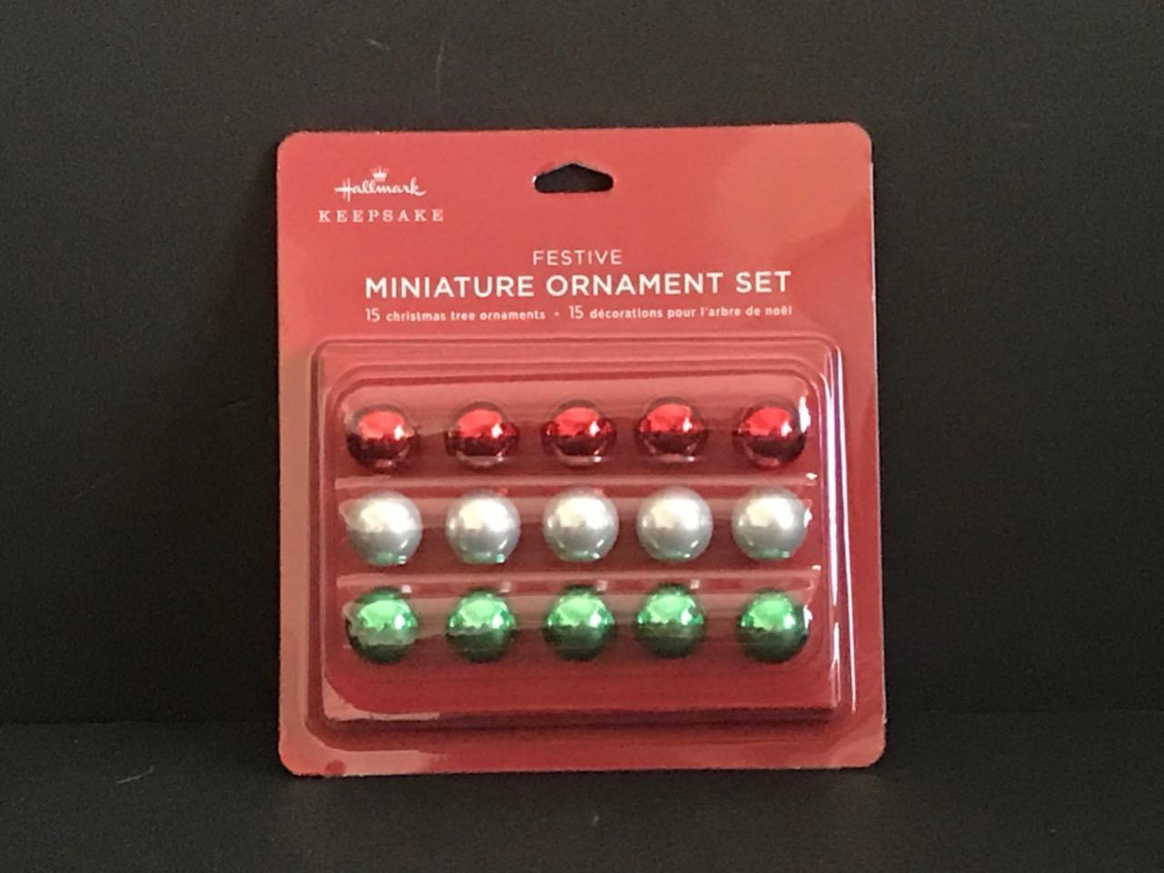 Festive miniature ornament ball set. Fifteen mini ornaments in red(5) silver(5) and green(5)