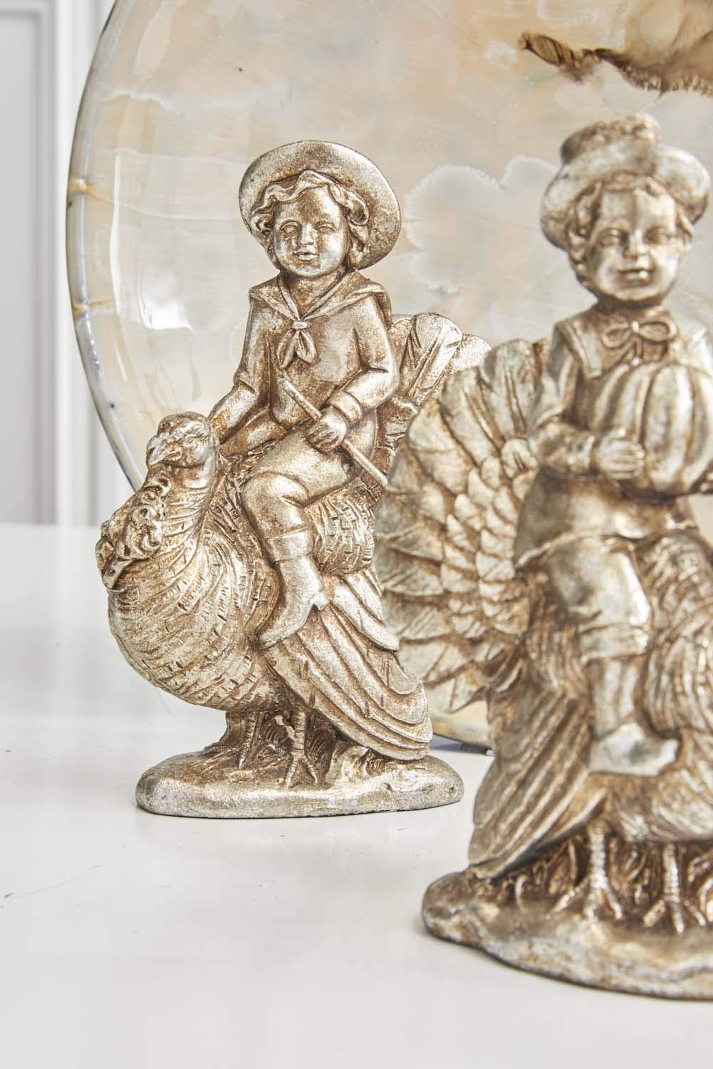 Antique Silver Resin Child Riding Turkey Figurine